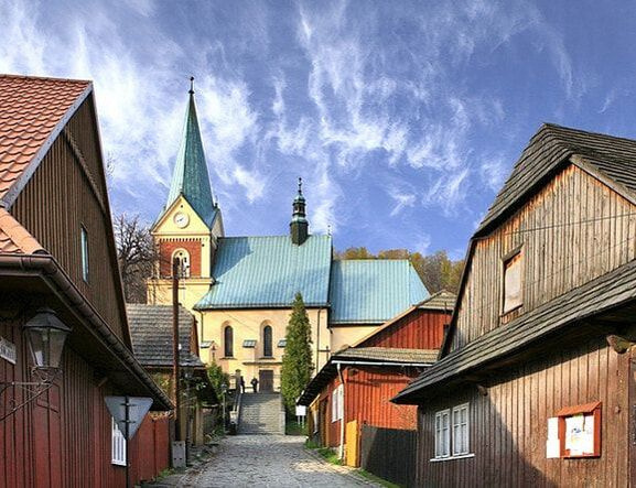 The Historic Angel Village of Lanckorona Road bike parked in front of the historic wooden houses in Lanckorona village near Kraków.